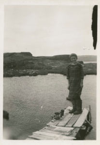 Image of Young girl on dock